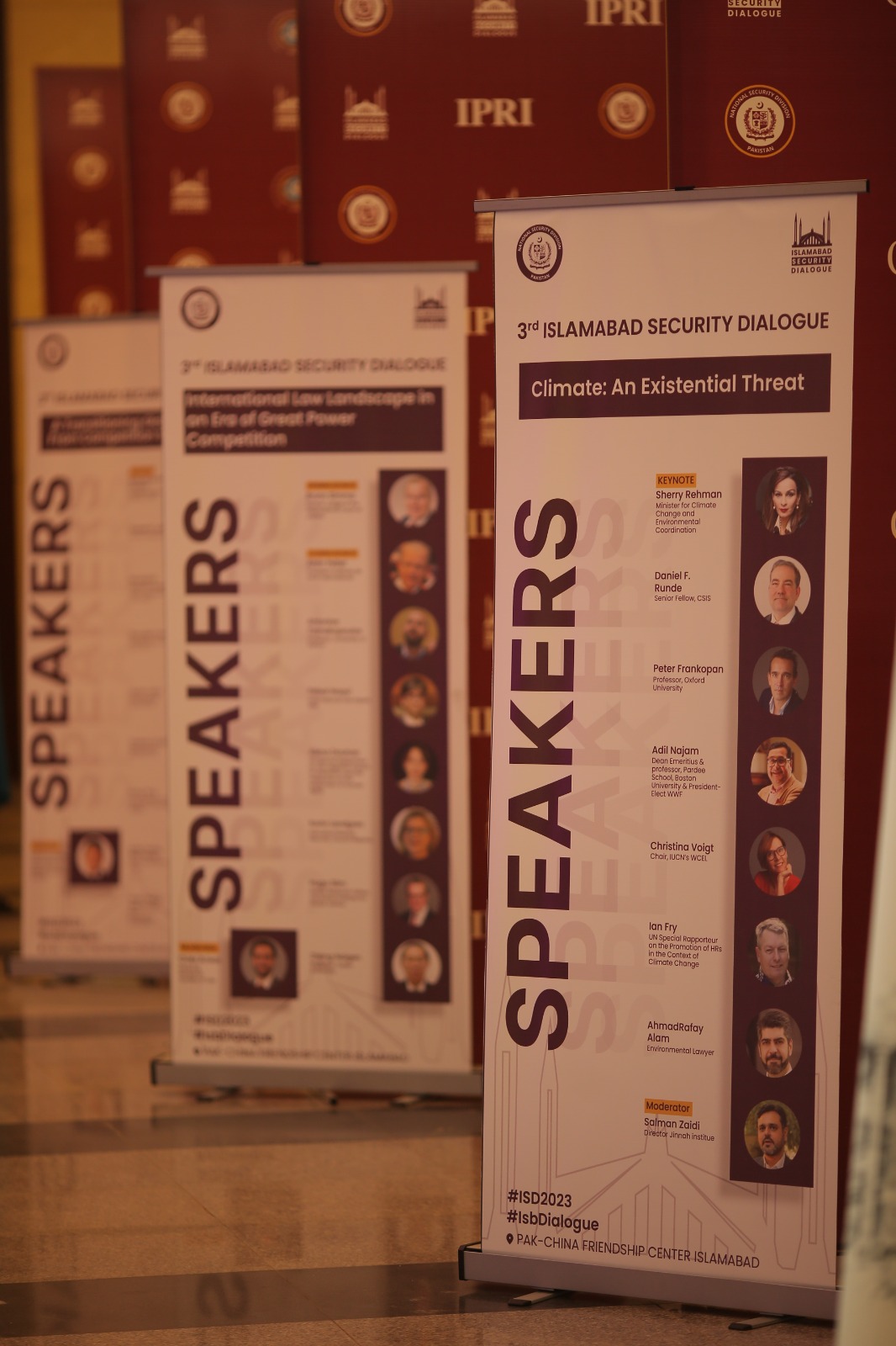 Roll-up banners listing session speakers at the Islamabad Security Dialogue 2023